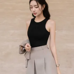 JDD embroidered tank top at the bottom of the collar